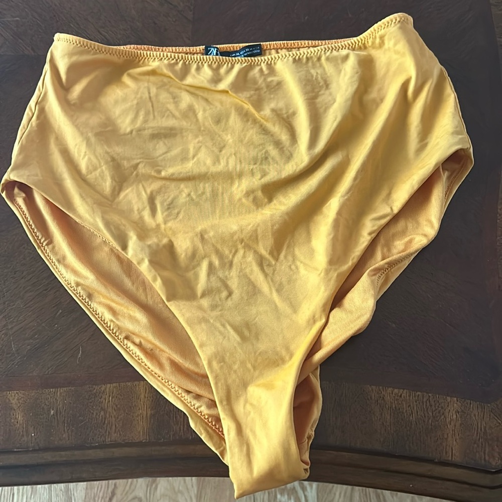 Orange High Rise bikini bottoms. Size XL. Never worn.